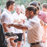 male eating food at a function